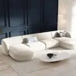 كنب زاوية, شكل حرف U, بتصميم أنيق وعملي، يوفّر مساحة واسعة, للجلوس والاسترخاء مع العائلة.