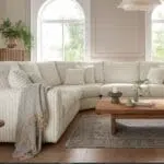 أريكة زاوية كبيرة، تصميم واسع، راحة استثنائية، مساحة كبيرة.