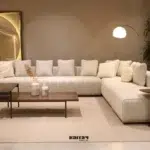 كنب زاوية جوان لون بيج قماش فاخر ناعم, يمنح غرفة المعيشة راحة مثالية ولمسة أنيقة،